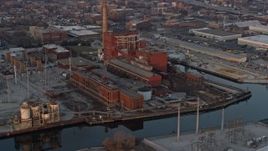 4K aerial stock footage of the Fisk Generating Station at sunset, West Side Chicago, Illinois Aerial Stock Footage | AX0170_0008