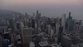 4K aerial stock footage of downtown's tall skyscrapers at sunset, Downtown Chicago, Illinois Aerial Stock Footage | AX0170_0035