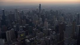 4K aerial stock footage approach and fly over downtown at sunset, Downtown Chicago, Illinois Aerial Stock Footage | AX0170_0043