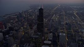 4K aerial stock footage of flying past Willis Tower and  311 South Wacker Drive at sunset, Downtown Chicago, Illinois Aerial Stock Footage | AX0170_0051