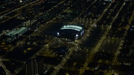 4K aerial stock footage of United Center arena at night, West Side Chicago, Illinois Aerial Stock Footage | AX0170_0073