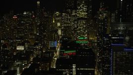 4K aerial stock footage of flying by city streets at night, Downtown Chicago, Illinois Aerial Stock Footage | AX0170_0099