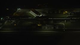 4K aerial stock footage of flying away from Stateville Correctional Center prison at night, Crest Hill, Illinois Aerial Stock Footage | AX0170_0132