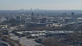 6.7K aerial stock footage tilt from Interstate 75 and heavy traffic, reveal Truist Park baseball stadium, Atlanta, Georgia Aerial Stock Footage | AX0171_0005