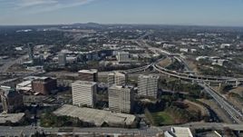 6.7K aerial stock footage of a wide orbit of office buildings and Truist Park baseball stadium, Atlanta, Georgia Aerial Stock Footage | AX0171_0008