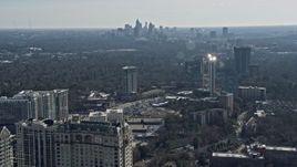 6.7K aerial stock footage approach the Midtown Atlanta skyline seen from Buckhead, Atlanta, Georgia Aerial Stock Footage | AX0171_0032