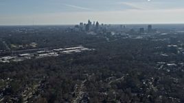 6.7K aerial stock footage tilt from homes to reveal Midtown Atlanta skyline, Atlanta, Georgia Aerial Stock Footage | AX0171_0034