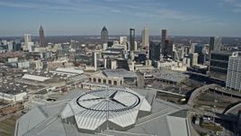 6.7K aerial stock footage fly over Mercedes-Benz Stadium toward Downtown Atlanta, Georgia Aerial Stock Footage | AX0171_0057