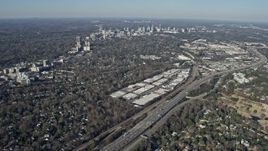 6.7K aerial stock footage tilt from office buildings to reveal Buckhead in the distance, Atlanta, Georgia Aerial Stock Footage | AX0171_0096