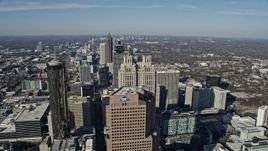6.7K aerial stock footage of flying by Downtown with a view of Midtown Atlanta in the distance, Georgia Aerial Stock Footage | AX0171_0107