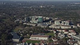 6.7K aerial stock footage of passing the Centers for Disease Control and Prevention in Atlanta, Georgia Aerial Stock Footage | AX0171_0111