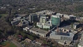 6.7K aerial stock footage of passing the Centers for Disease Control and Prevention in Atlanta, Georgia Aerial Stock Footage | AX0171_0120