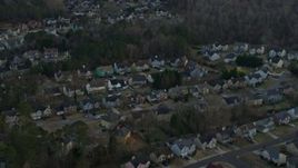 6.7K aerial stock footage of flying by suburban neighborhoods at sunset, Lawrenceville, Georgia Aerial Stock Footage | AX0171_0137