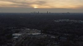 6.7K aerial stock footage of approaching the Atlanta skyline at sunset from Decatur, Georgia Aerial Stock Footage | AX0171_0141