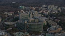 6.7K aerial stock footage of flying past the Centers for Disease Control and Prevention at sunset, Atlanta, Georgia Aerial Stock Footage | AX0171_0146