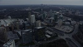 6.7K aerial stock footage reverse view of office buildings and skyscrapers at sunset, Atlanta, Georgia Aerial Stock Footage | AX0171_0175