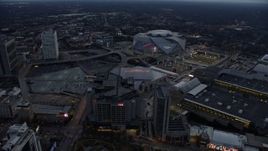 6.7K aerial stock footage orbit arena, CNN Center, and stadium at sunset in Atlanta, Georgia Aerial Stock Footage | AX0171_0191