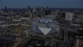 6.7K aerial stock footage of orbiting Mercedes-Benz Stadium at sunset in Downtown Atlanta, Georgia Aerial Stock Footage | AX0171_0194