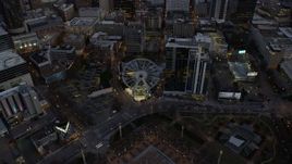 6.7K aerial stock footage approach skyscrapers and tilt to Ferris wheel at sunset, Downtown Atlanta, Georgia Aerial Stock Footage | AX0171_0199