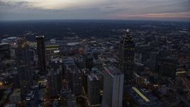 6.7K aerial stock footage wide view of Atlanta beyond skyscrapers at sunset, Downtown Atlanta, Georgia Aerial Stock Footage | AX0171_0201