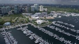 6.7K aerial stock footage fly over marina to circle city hall, Miami, Florida Aerial Stock Footage | AX0172_008