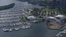 6.7K aerial stock footage of Miami City Hall beside a marina in Miami, Florida Aerial Stock Footage | AX0172_011