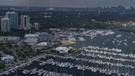 6.7K aerial stock footage flyby Miami City Hall, reveal distant skyline in Miami, Florida Aerial Stock Footage | AX0172_012
