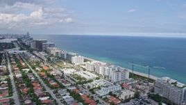 6.7K aerial stock footage fly over condos and hotels to reveal beach in Bal Harbour, Florida Aerial Stock Footage | AX0172_027
