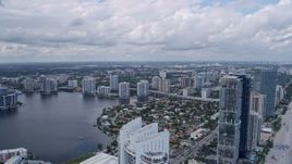 6.7K aerial stock footage fly over condo high-rises in Sunny Isles Beach, Florida toward Aventura and Golden Beach Aerial Stock Footage | AX0172_032