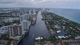 6.7K aerial stock footage following the river between Aventura and Golden Beach neighborhoods in Florida Aerial Stock Footage | AX0172_033