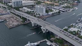 6.7K aerial stock footage approach a bridge over the Stranahan River near Downtown Fort Lauderdale, Florida Aerial Stock Footage | AX0172_043