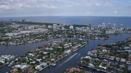 6.7K aerial stock footage of flying over canals and neighborhoods near the coast in Fort Lauderdale, Florida Aerial Stock Footage | AX0172_060
