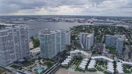 6.7K aerial stock footage pan from beachfront condos to Port Everglades in Fort Lauderdale, Florida Aerial Stock Footage | AX0172_065