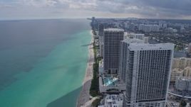 6.7K aerial stock footage flyby condo high-rises in Hollywood, Florida for view of Golden Beach Aerial Stock Footage | AX0172_071