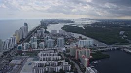 6.7K aerial stock footage the distant Miami skyline seen from Sunny Isles Beach, Florida Aerial Stock Footage | AX0172_074
