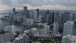 6.7K aerial stock footage of bayfront skyscrapers seen while passing Brickell Key in Downtown Miami, Florida Aerial Stock Footage | AX0172_084