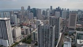 6.7K aerial stock footage of flying past skyscrapers in Downtown Miami, Florida Aerial Stock Footage | AX0172_089