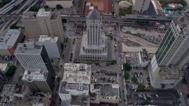 6.7K aerial stock footage approach the Miami-Dade County Courthouse, tilt to bird's eye view in Downtown Miami, Florida Aerial Stock Footage | AX0172_092