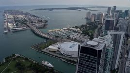 6.7K aerial stock footage orbit arena with view of port, Biscayne Bay, and skyscrapers in Downtown Miami, Florida Aerial Stock Footage | AX0172_098