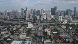 6.7K aerial stock footage a reverse view of skyscrapers and city buildings in Downtown Miami, Florida Aerial Stock Footage | AX0172_103