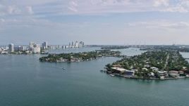 6.7K aerial stock footage of waterfront mansions on islands in Miami, Florida Aerial Stock Footage | AX0172_124
