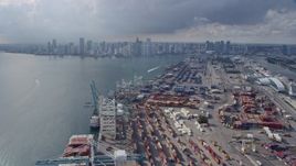 6.7K aerial stock footage of flying over Port of Miami to approach Downtown Miami, Florida Aerial Stock Footage | AX0172_146