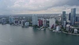 6.7K aerial stock footage of flying past condo complexes on the shore, Downtown Miami, Florida Aerial Stock Footage | AX0172_154