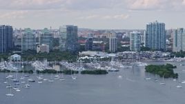 6.7K aerial stock footage of flying by a marina and condominium complexes, Miami, Florida Aerial Stock Footage | AX0172_157