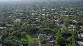 6.7K aerial stock footage of flying over suburban neighborhoods in Pinecrest, Florida Aerial Stock Footage | AX0172_159