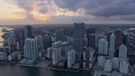 6.7K aerial stock footage flyby skyscrapers and reveal the river in Downtown Miami, Florida at sunset Aerial Stock Footage | AX0172_172