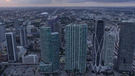 6.7K aerial stock footage of passing a group of skyscrapers in Downtown Miami, Florida at sunset Aerial Stock Footage | AX0172_174