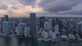 6.7K aerial stock footage fly over Brickell Key and skyscrapers in Downtown Miami, Florida at sunset, reveal Little Havana Aerial Stock Footage | AX0172_176