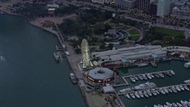 6.7K aerial stock footage reverse view of park and Ferris wheel in Downtown Miami at sunset, Miami, Florida Aerial Stock Footage | AX0172_192