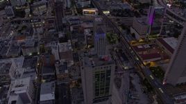 6.7K aerial stock footage tilt to and approach the courthouse in Downtown Miami at twilight, Florida Aerial Stock Footage | AX0172_205